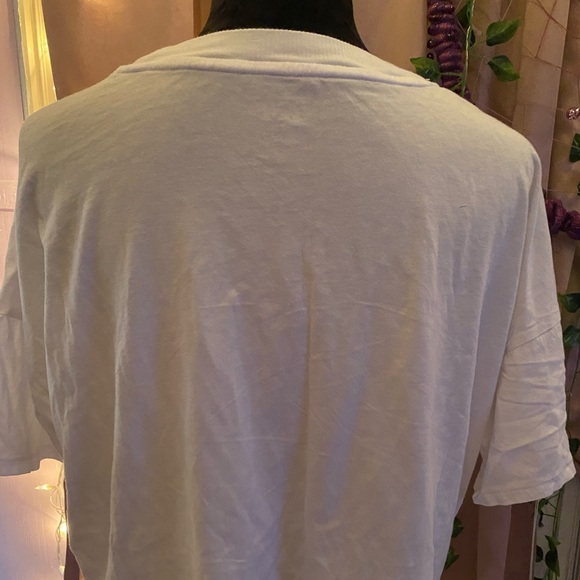 large and lose fitting, multi colored words but plain white shirt, very cute! - Picture 4 of 5